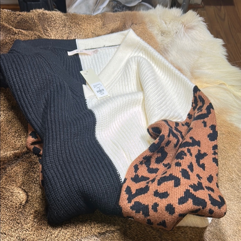 Francescas Stylish Black and White Sweater with Leopard Accents